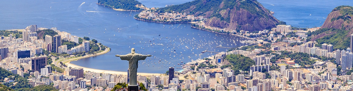 Aerial view of the Christ, The Redeemer Monument and the Corcovado Mountain in Rio de Janeiro, Brazil. One of the Seven Wonders of the World the monument is a must-go spot do travelers upon visiting Rio. Along with the beautiful statue the view of the Corcovado is breathtaking with the Sugarloaf Mountain and the Botafogo Bay among some of the places you can see from up there.